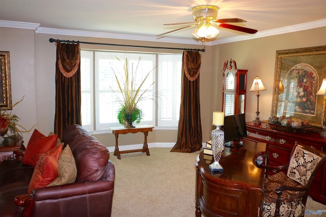 home office with ceiling fan, carpet flooring, baseboards, and ornamental molding