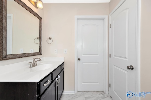 217 Skehan St SW, Huntsville, AL 35824 - bathroom featuring vanity and marble finish floors