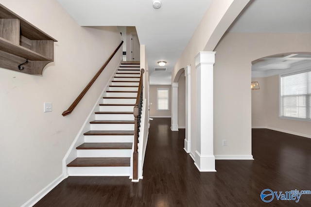 staircase with wood-type flooring