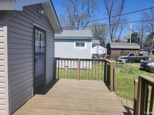 wooden deck with a yard