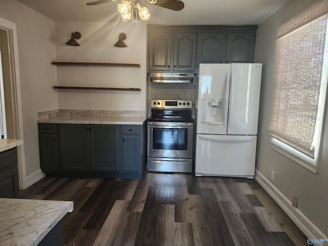 kitchen featuring open shelves, white fridge with ice dispenser, a ceiling fan, under cabinet range hood, and electric range