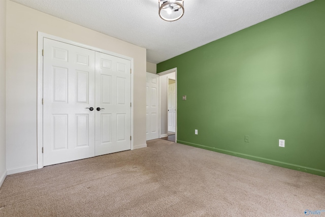 123 Turtle Ridge Dr, New Market, AL 35761 - unfurnished bedroom with carpet, baseboards, and a textured ceiling