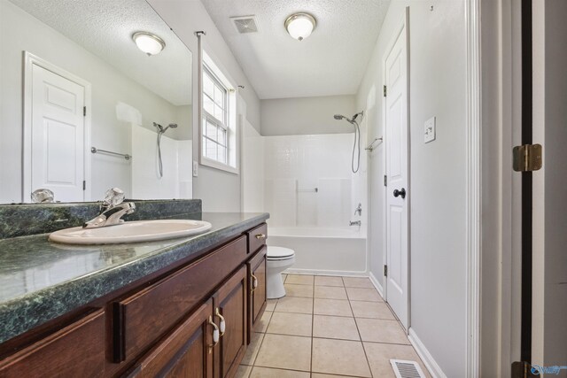 123 Turtle Ridge Dr, New Market, AL 35761 - full bath with toilet, vanity, a textured ceiling, tile patterned flooring, and  shower combination