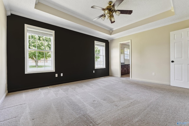 123 Turtle Ridge Dr, New Market, AL 35761 - carpeted empty room with a tray ceiling, crown molding, a ceiling fan, baseboards, and a textured ceiling