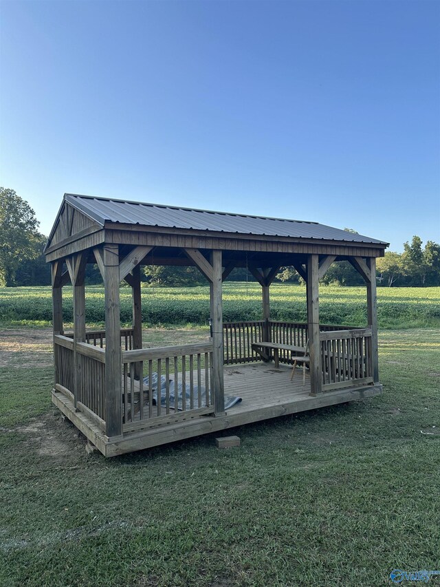 exterior space featuring a gazebo and a yard