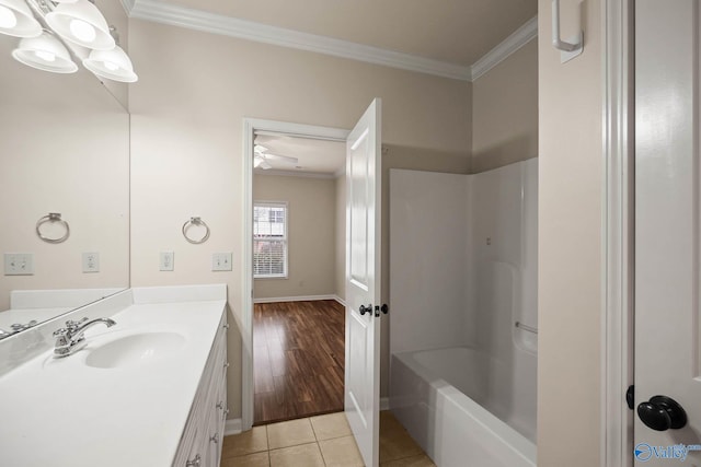 full bathroom with shower / bathtub combination, tile patterned flooring, vanity, and crown molding