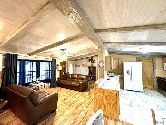 living area with lofted ceiling with beams, marble finish floor, ceiling fan, and wood ceiling