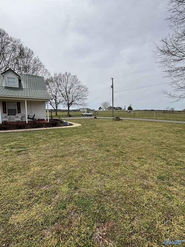 view of yard with a porch