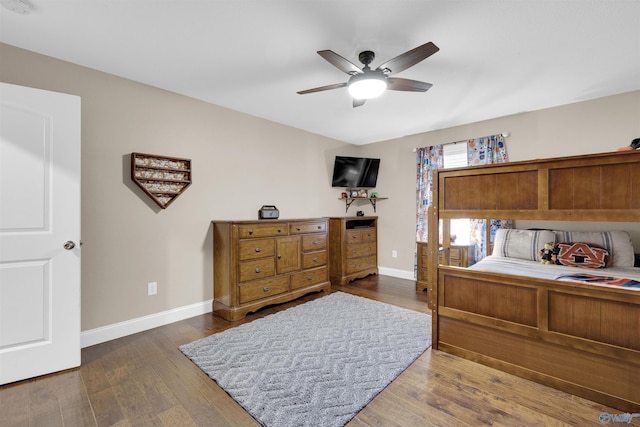 bedroom with ceiling fan and wood-type flooring