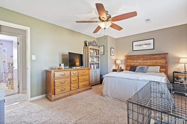 bedroom with light carpet and ceiling fan