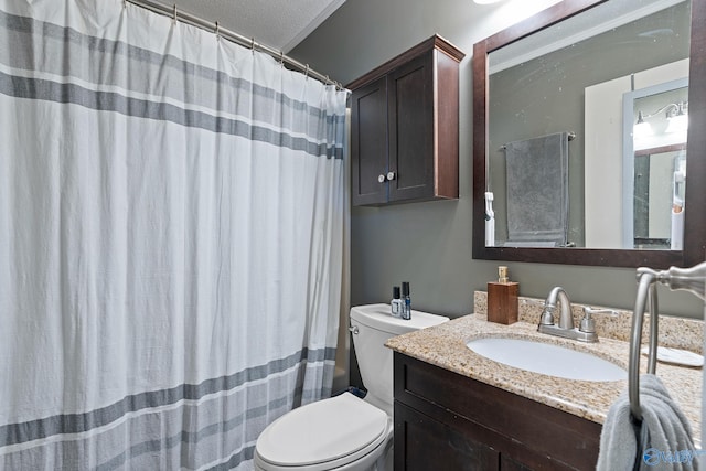 bathroom with vanity, a textured ceiling, toilet, and a shower with shower curtain