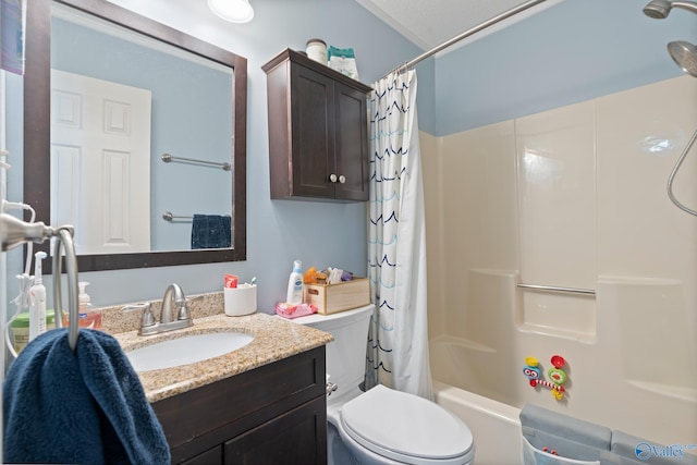 full bathroom with vanity, toilet, and shower / tub combo