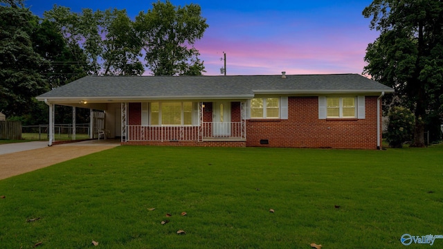 4212 Mcclain Ln NW, Huntsville, AL 35810 - ranch-style house with concrete driveway, covered porch, brick siding, an attached carport, and crawl space