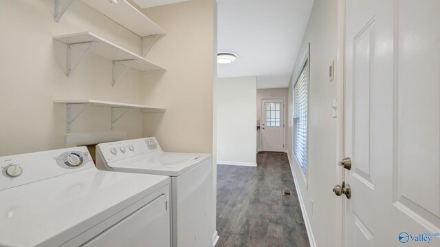 4212 Mcclain Ln NW, Huntsville, AL 35810 - laundry room with washing machine and clothes dryer, dark wood-style floors, and baseboards