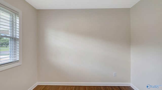 4212 Mcclain Ln NW, Huntsville, AL 35810 - empty room with baseboards and wood finished floors