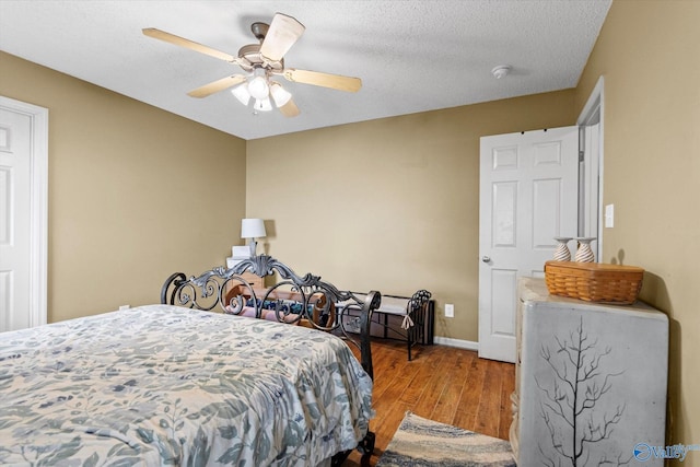 213 Hollington Dr, Huntsville, AL 35811 - bedroom featuring wood finished floors and a ceiling fan