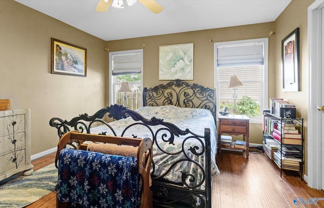 213 Hollington Dr, Huntsville, AL 35811 - bedroom with wood finished floors and ceiling fan