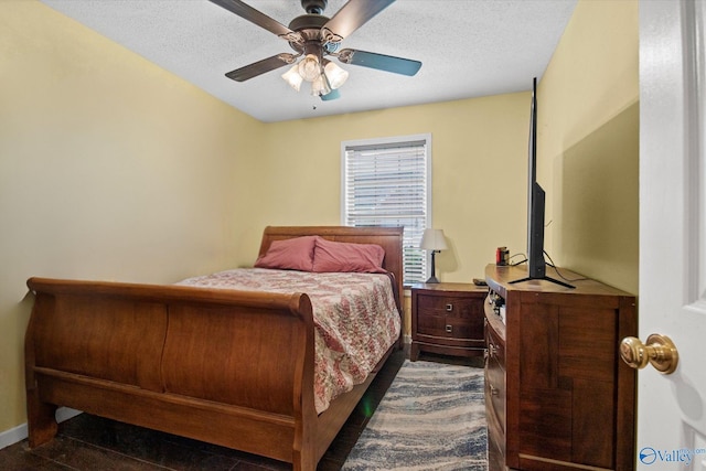 213 Hollington Dr, Huntsville, AL 35811 - bedroom featuring ceiling fan and a textured ceiling