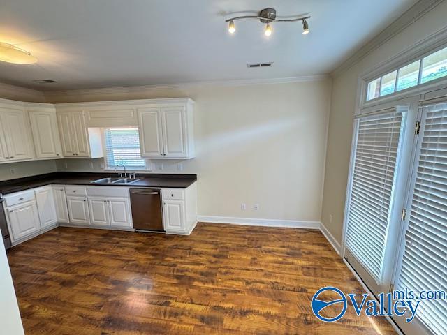 15031 Ashmont Blvd SE, Huntsville, AL 35803 - kitchen featuring stainless steel dishwasher, a sink, visible vents, and plenty of natural light