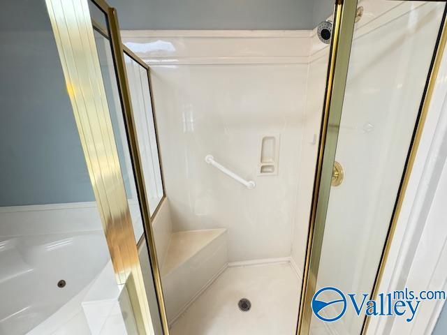 15031 Ashmont Blvd SE, Huntsville, AL 35803 - full bath with a garden tub and a stall shower