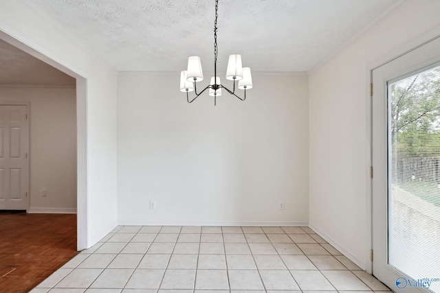 1502 Bower Dr SE, Cullman, AL 35055 - empty room with a textured ceiling, crown molding, baseboards, a notable chandelier, and light tile patterned floors