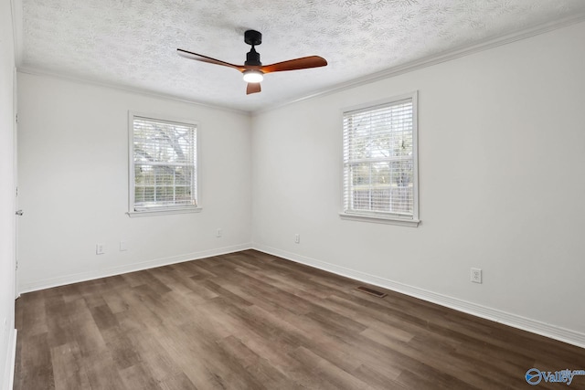 1502 Bower Dr SE, Cullman, AL 35055 - unfurnished room with ornamental molding, dark wood-type flooring, a textured ceiling, ceiling fan, and visible vents