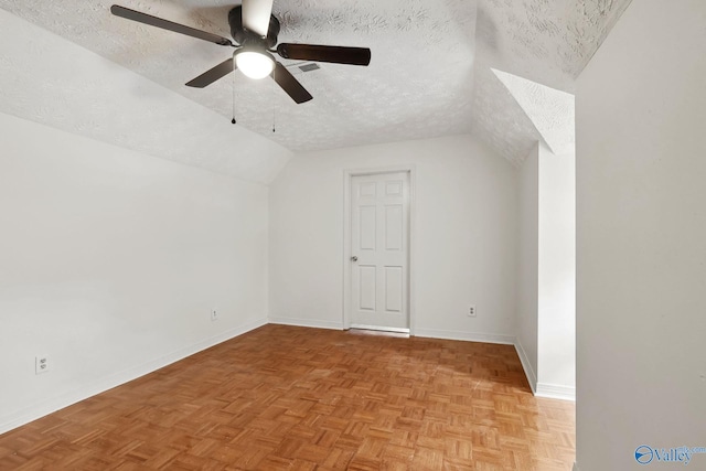 1502 Bower Dr SE, Cullman, AL 35055 - additional living space with lofted ceiling, baseboards, a textured ceiling, visible vents, and ceiling fan