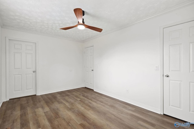 1502 Bower Dr SE, Cullman, AL 35055 - empty room with ornamental molding, a textured ceiling, and wood finished floors