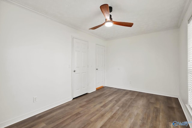 1502 Bower Dr SE, Cullman, AL 35055 - unfurnished bedroom with ornamental molding, baseboards, ceiling fan, and wood finished floors