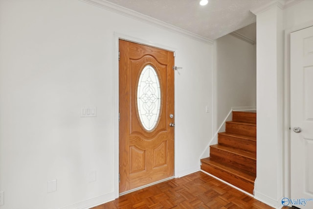 1502 Bower Dr SE, Cullman, AL 35055 - foyer with ornamental molding, baseboards, stairway, and a textured ceiling