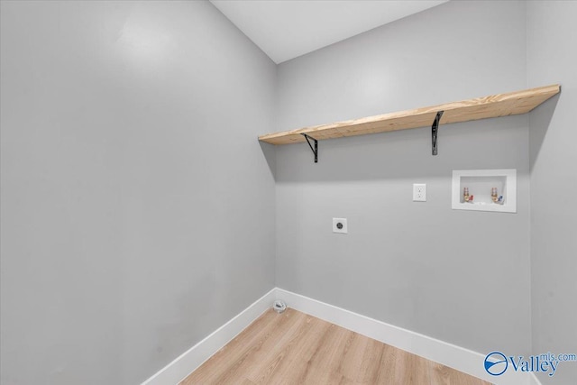 laundry room with washer hookup, electric dryer hookup, wood finished floors, laundry area, and baseboards