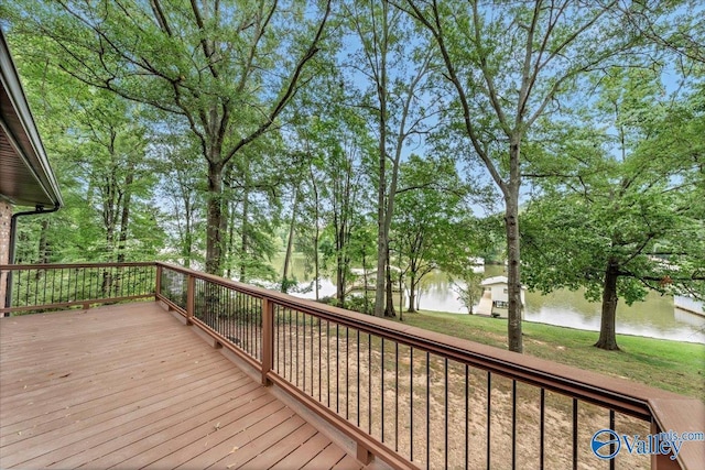 wooden deck featuring a water view