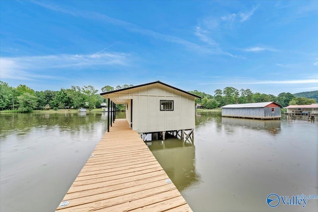 dock area featuring a water view