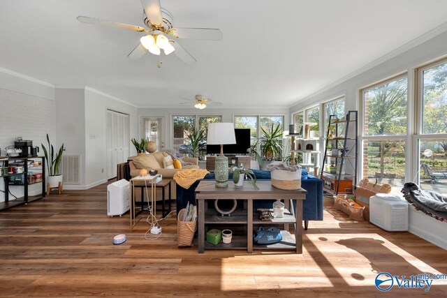 4315 Horace Dr NW, Huntsville, AL 35816 - living room featuring ceiling fan, wood-type flooring, and crown molding