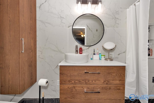 4315 Horace Dr NW, Huntsville, AL 35816 - bathroom featuring vanity and tile walls