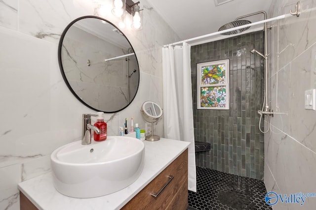 4315 Horace Dr NW, Huntsville, AL 35816 - bathroom with a shower with curtain, vanity, and tile walls