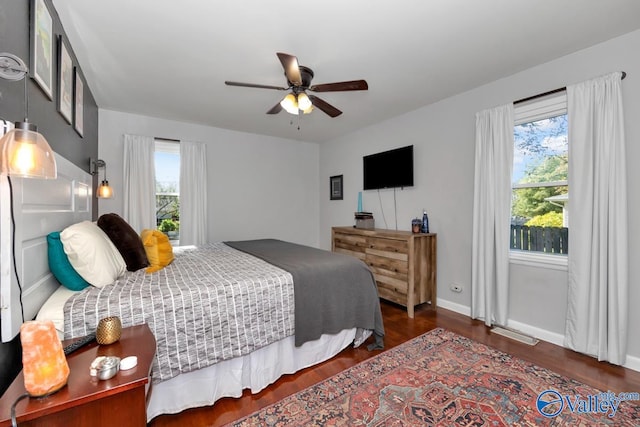 4315 Horace Dr NW, Huntsville, AL 35816 - bedroom featuring multiple windows, ceiling fan, and dark wood-type flooring