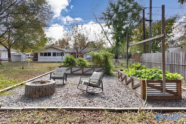 4315 Horace Dr NW, Huntsville, AL 35816 - view of patio featuring an outdoor fire pit