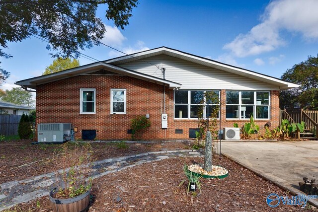 4315 Horace Dr NW, Huntsville, AL 35816 - view of front of home with central AC, a patio area, and ac unit
