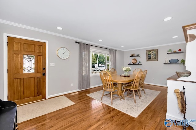 4315 Horace Dr NW, Huntsville, AL 35816 - dining space featuring dark wood-type flooring and ornamental molding