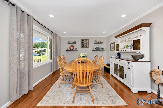 4315 Horace Dr NW, Huntsville, AL 35816 - dining space with light hardwood / wood-style floors and ornamental molding