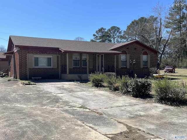 ranch-style house with brick siding