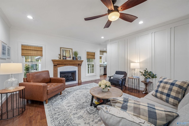 1635 County Road 47, Fyffe, AL 35971 - living area featuring crown molding, wood finished floors, a glass covered fireplace, recessed lighting, and ceiling fan