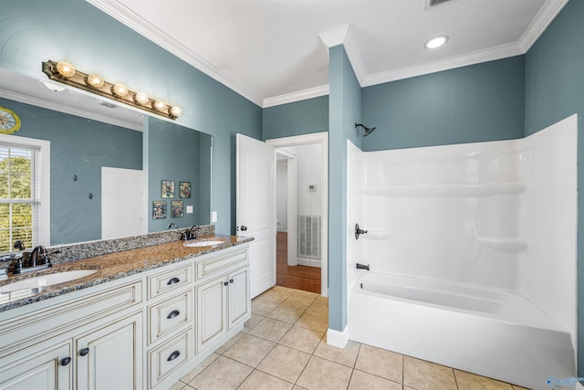 1635 County Road 47, Fyffe, AL 35971 - full bathroom featuring tile patterned floors, tub / shower combination, ornamental molding, double vanity, and baseboards