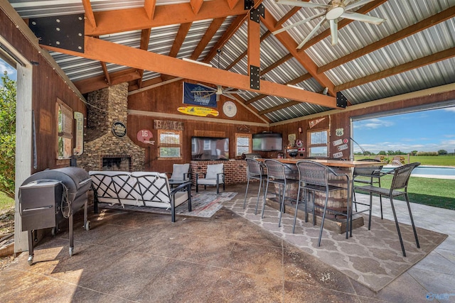 1635 County Road 47, Fyffe, AL 35971 - view of patio with a ceiling fan, an outdoor bar, an outdoor living space with a fireplace, and a gazebo