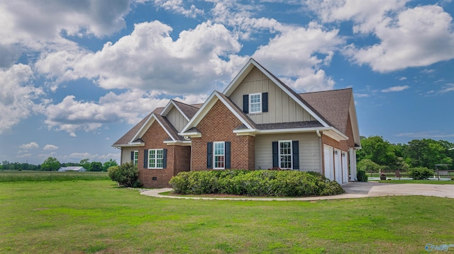 1635 County Road 47, Fyffe, AL 35971 - craftsman-style home featuring board and batten siding, driveway, a front lawn, and brick siding