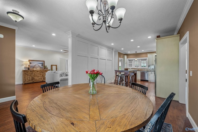 1635 County Road 47, Fyffe, AL 35971 - dining space with dark wood-style floors, recessed lighting, baseboards, a chandelier, and crown molding