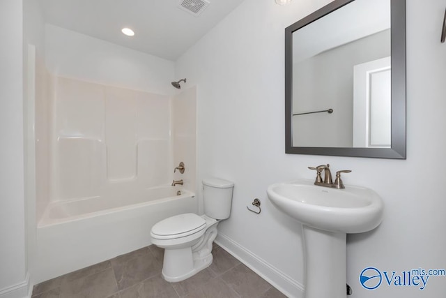 full bathroom with sink, tile patterned floors, shower / washtub combination, and toilet