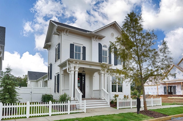 view of front of home with a front lawn