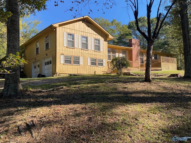 view of property exterior featuring an attached garage